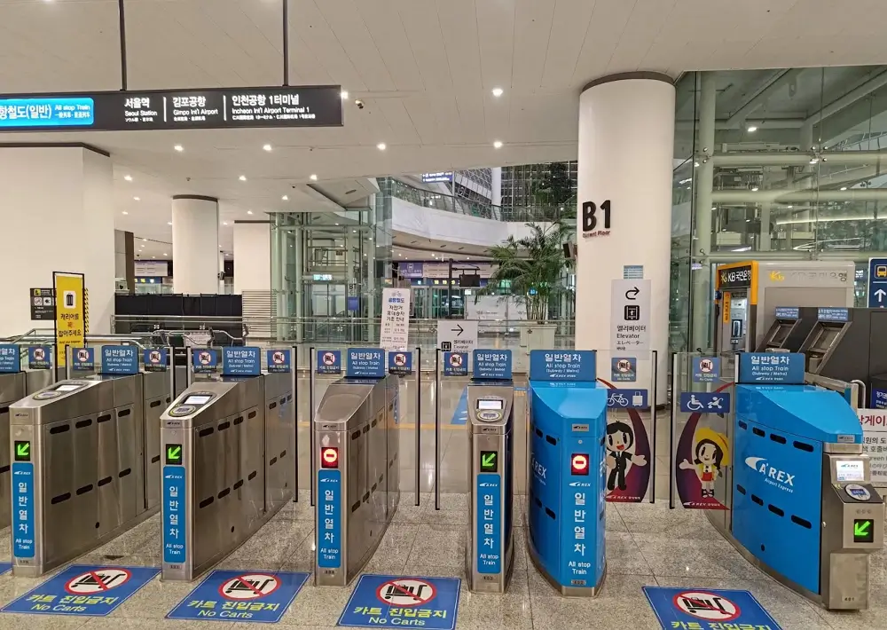 Blue AREX All-stop train ticket gates at Incheon Airport Terminal 1