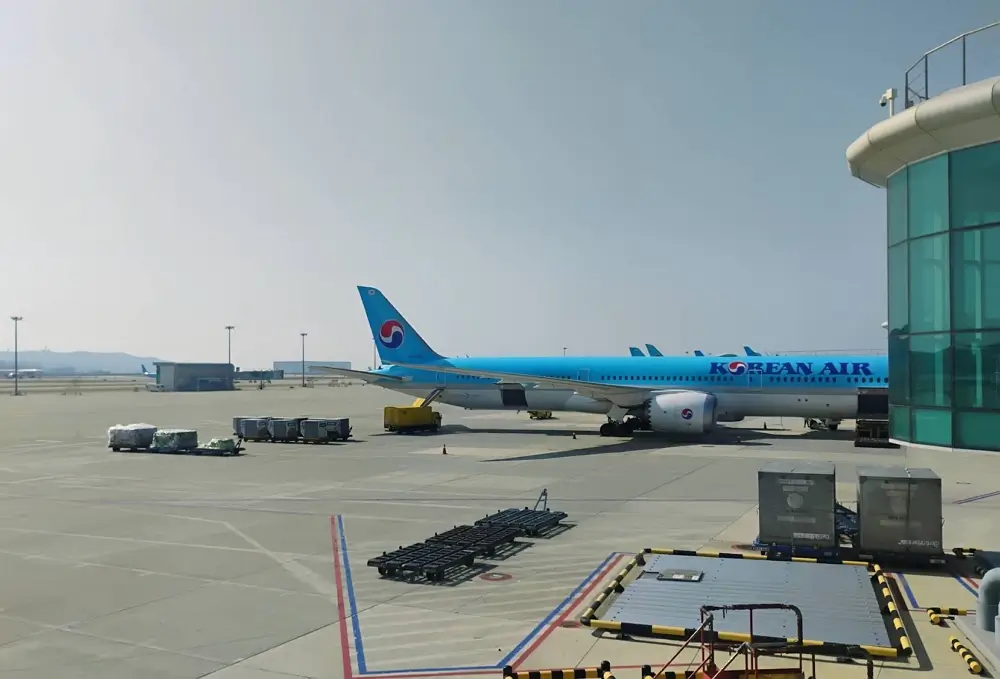 orean Air airplane parked at Incheon International Airport terminal